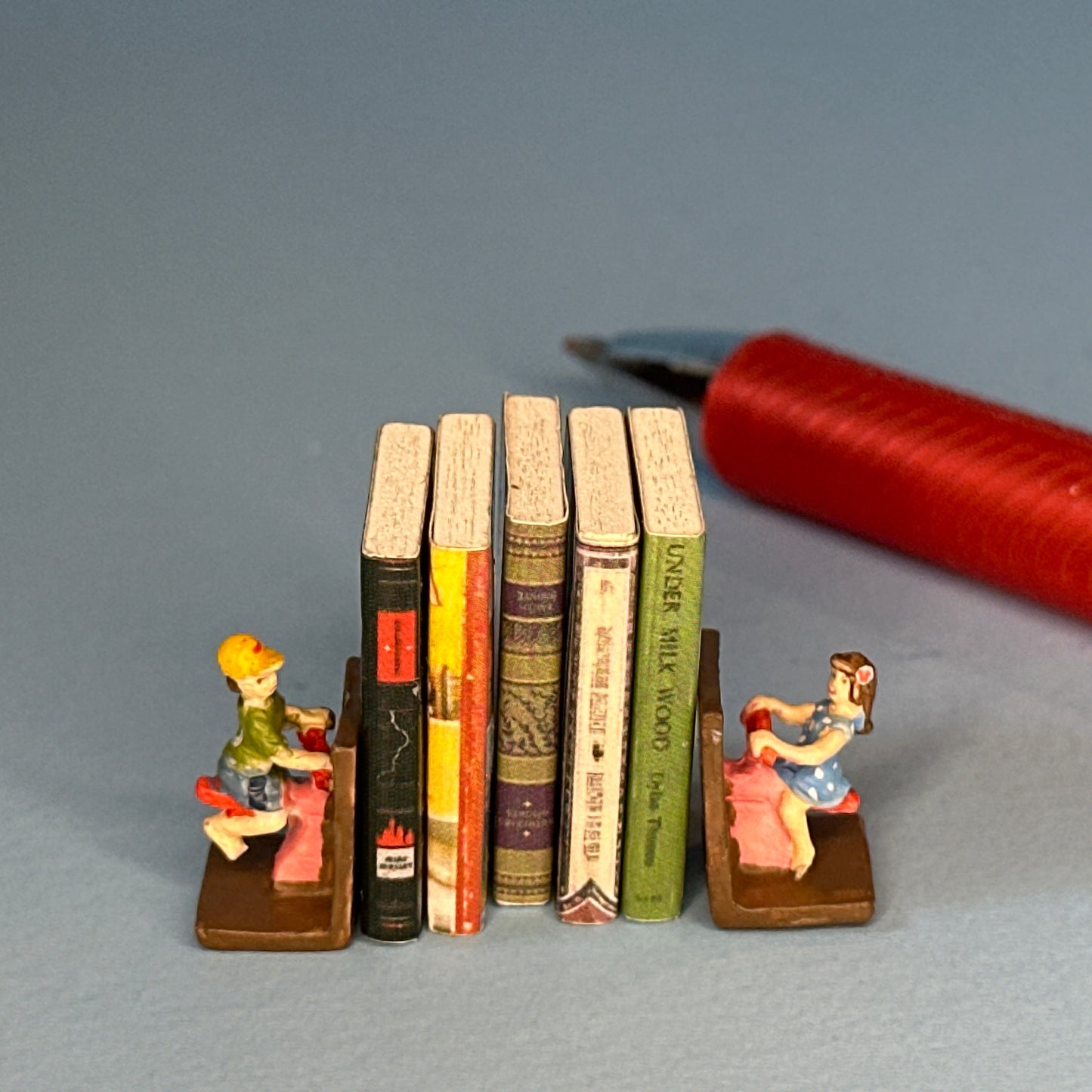 Miniature Hand-Painted Boy & Girl Bookends on Swings – 1:12 Scale