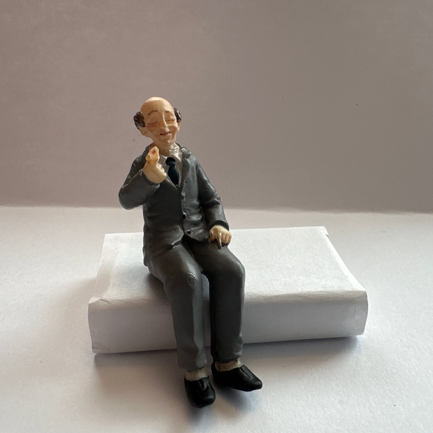 Miniature Doll 1:24 – Seated Grandpa in a Gray Suit