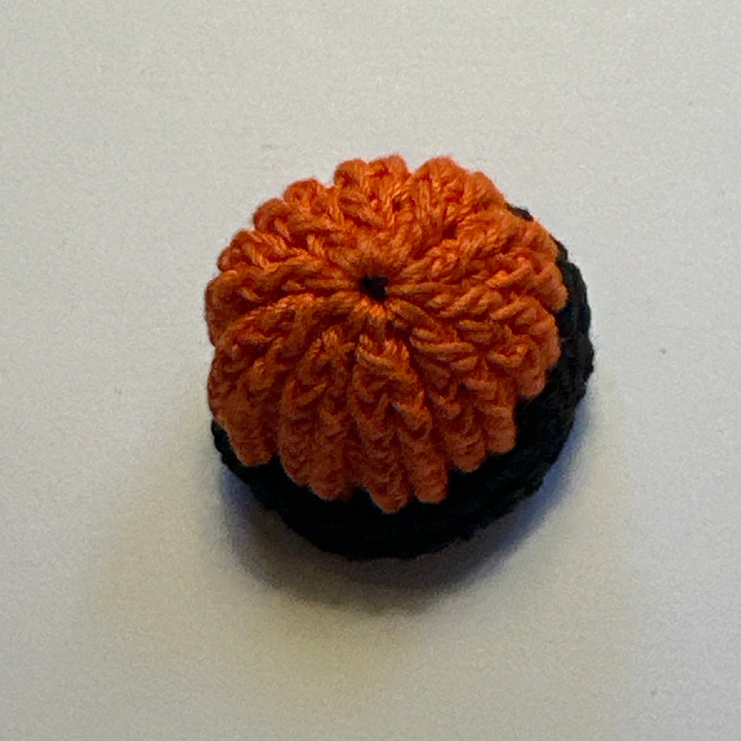 Dollhouse Miniature – Orange Knitted Hat with Black Trim 1:12