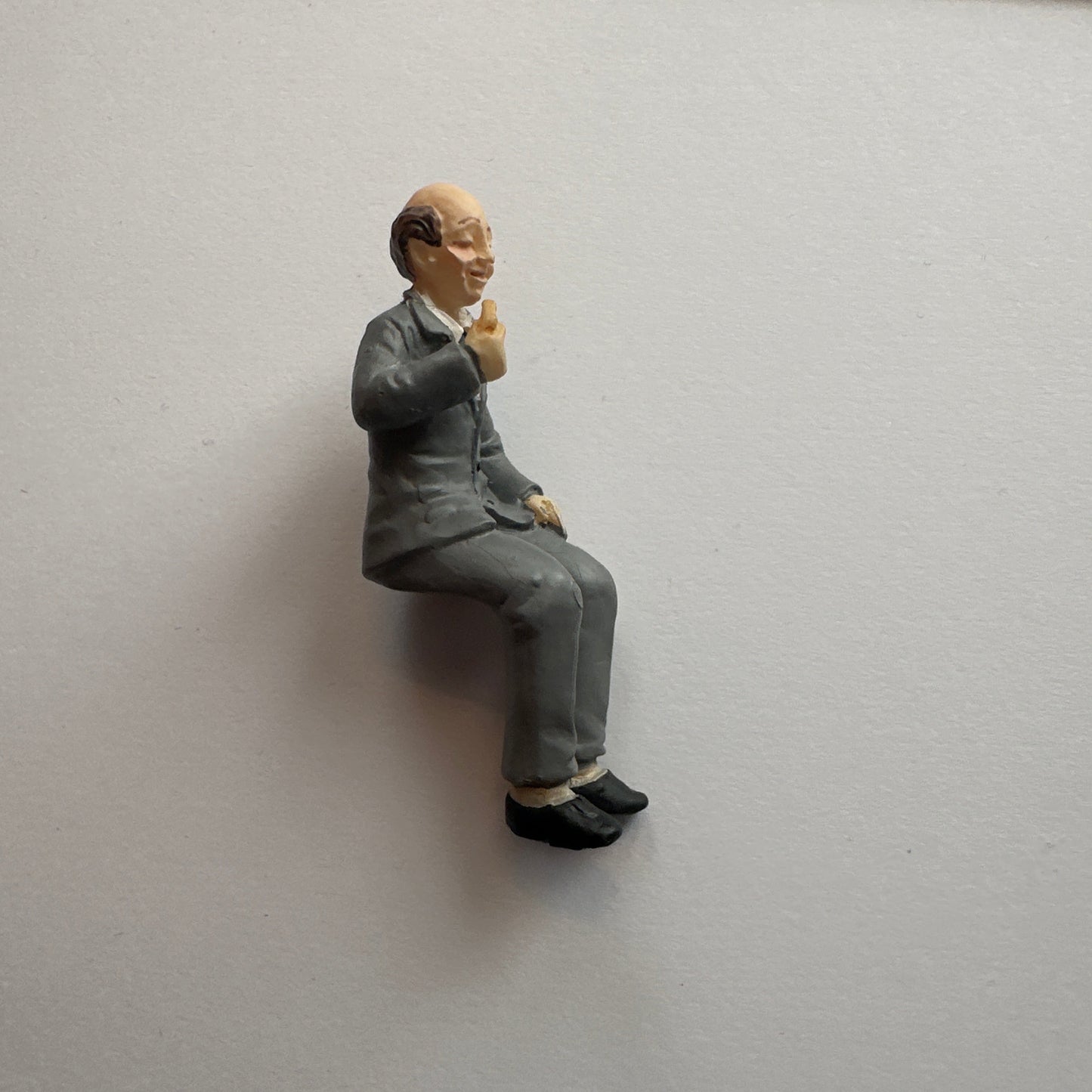 Miniature Doll 1:24 – Seated Grandpa in a Gray Suit