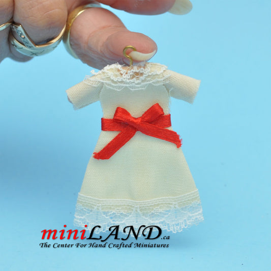 Yellow dress with red bow on hanger dollhouse miniature 1:12