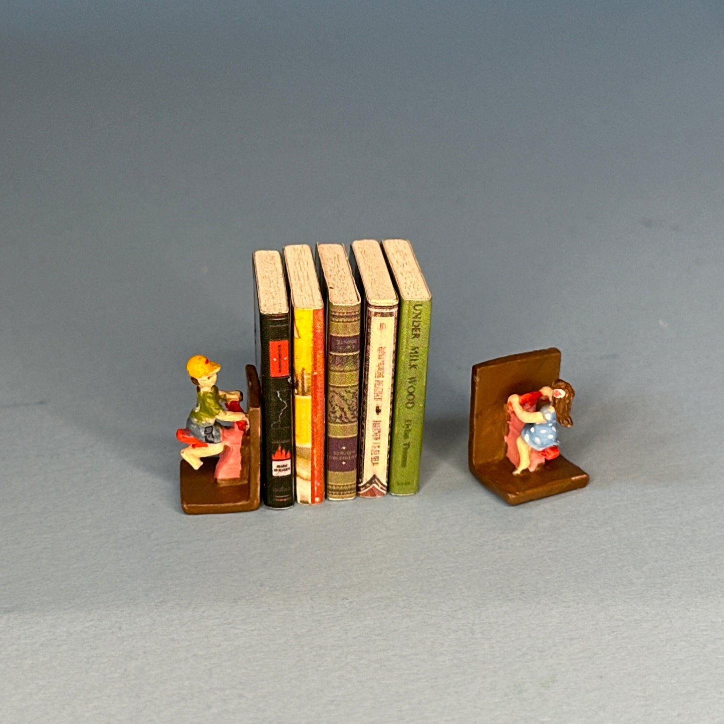 Miniature Hand-Painted Boy & Girl Bookends on Swings – 1:12 Scale