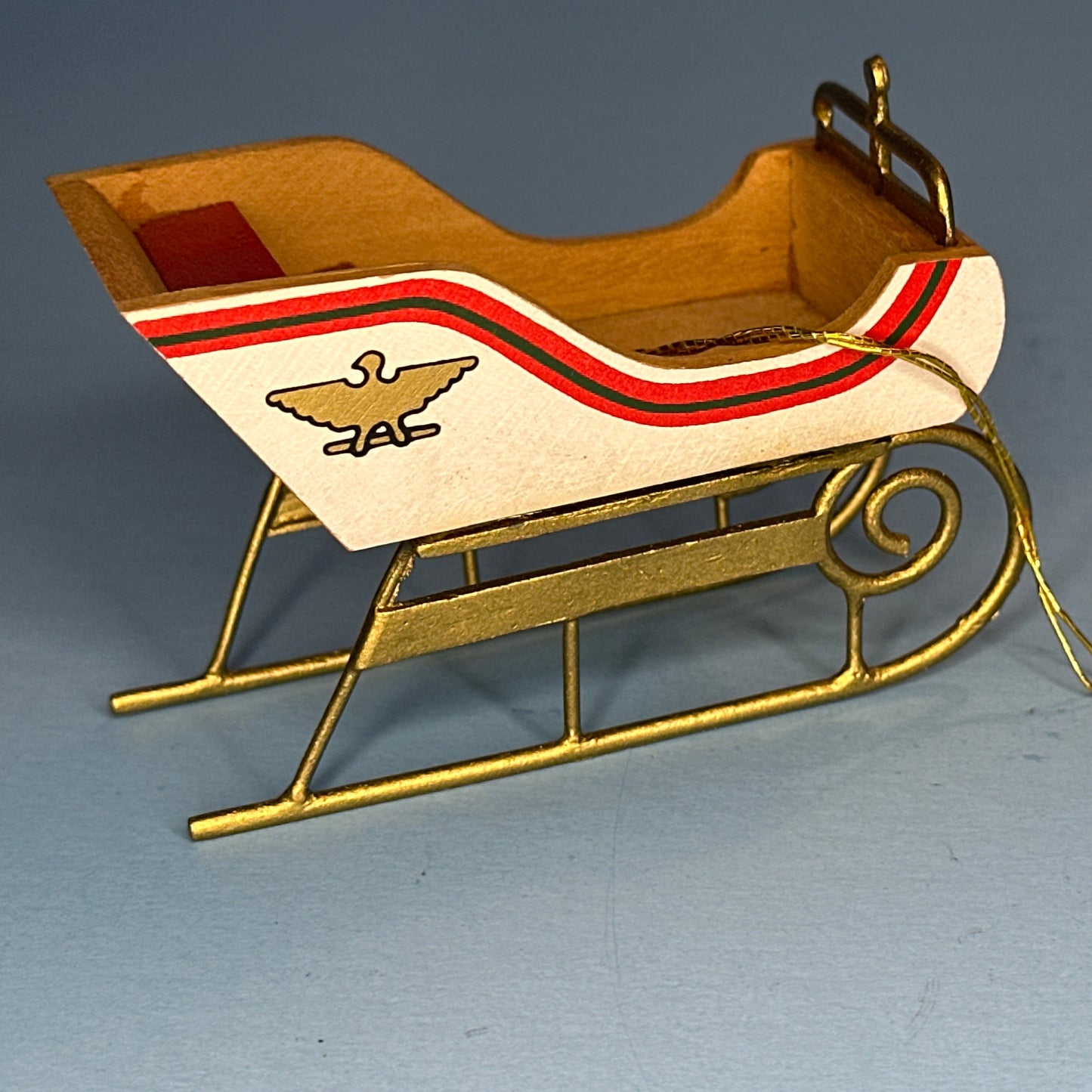 Miniature Decorative Sled with Golden Accents and Eagle Motifs – 1:12 Scale