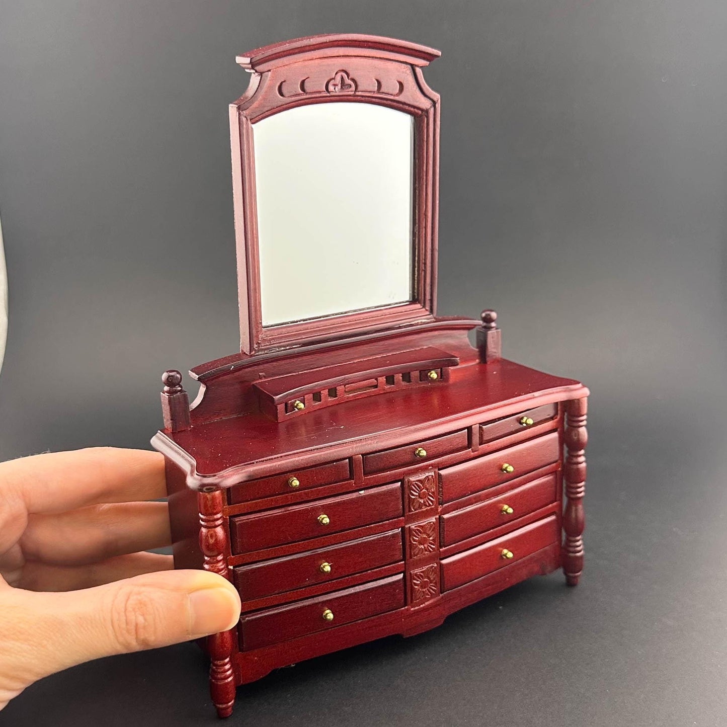 Miniature dresser with mirror for 1:12 scale dollhouse wood In mahogany color with functional drawers.