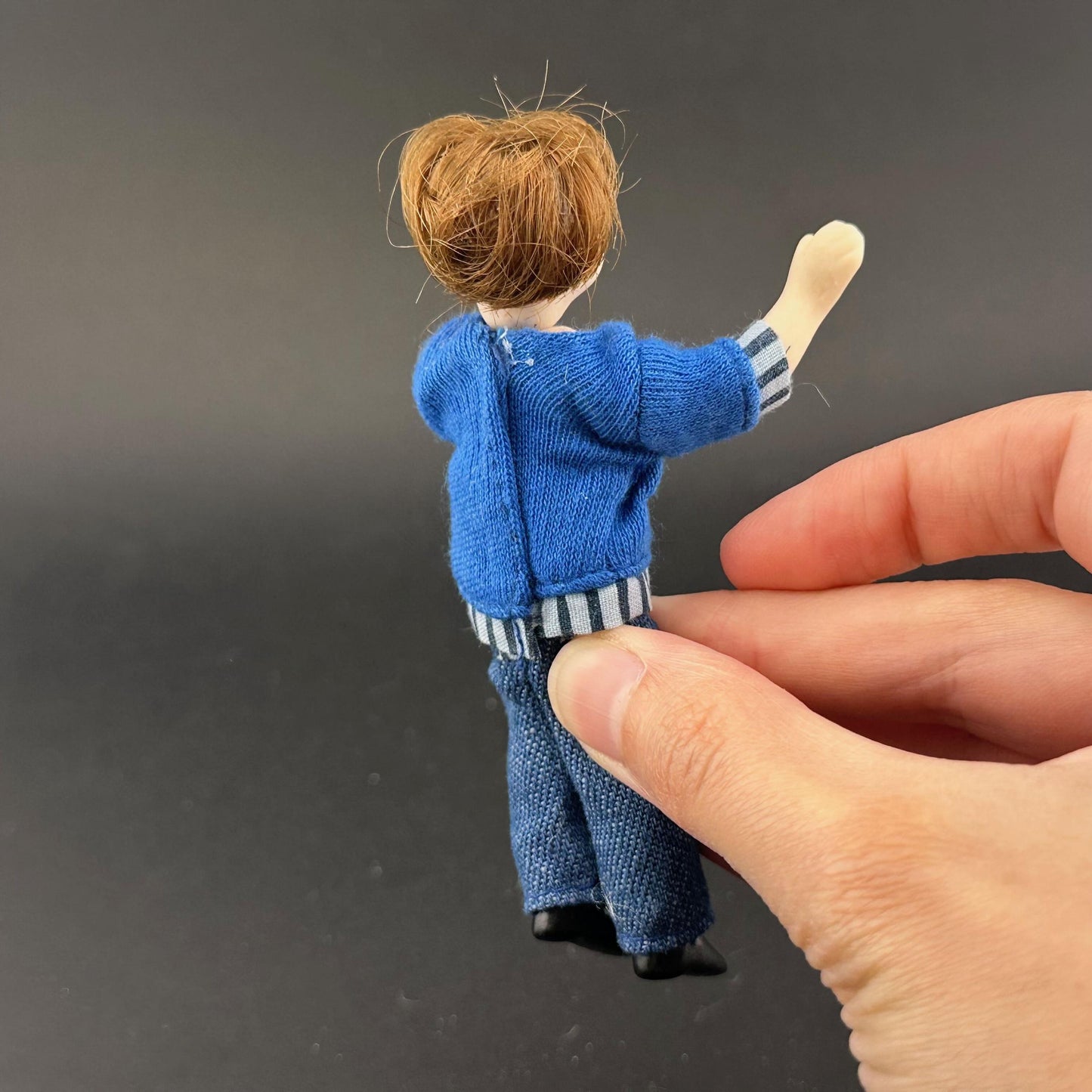 1:12 Scale Porcelain girl Doll – Dollhouse Miniature Child – Movable Head and Limbs – Blue Sweater & Jeans – 4” (10 cm)