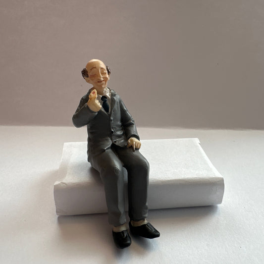 Miniature Doll 1:24 – Seated Grandpa in a Gray Suit