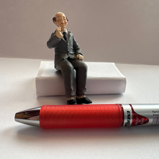 Miniature Doll 1:24 – Seated Grandpa in a Gray Suit