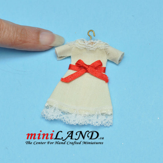 Yellow dress with red bow on hanger dollhouse miniature 1:12