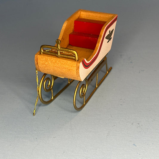 Miniature Decorative Sled with Golden Accents and Eagle Motifs – 1:12 Scale