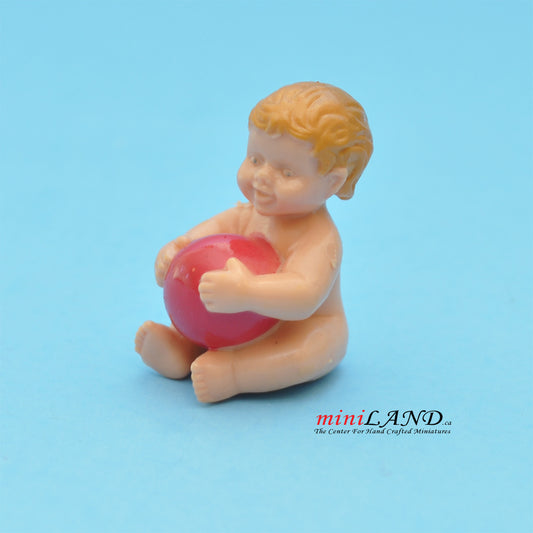 A baby sitting with a ball Doll for 1:12 dollhouse miniature