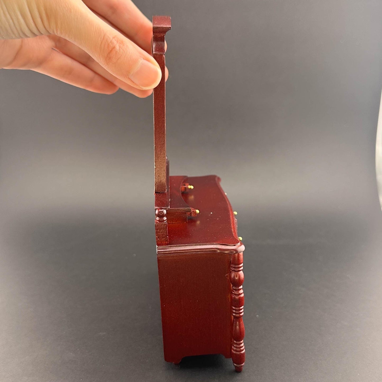 Miniature dresser with mirror for 1:12 scale dollhouse wood In mahogany color with functional drawers.