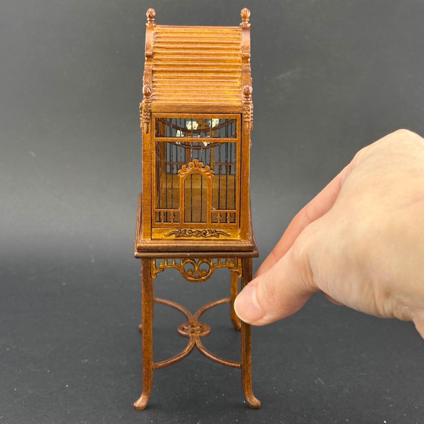 A magnificent wooden classic Victorian bird cage with a table for a 1:12 dollhouse miniature Walnut