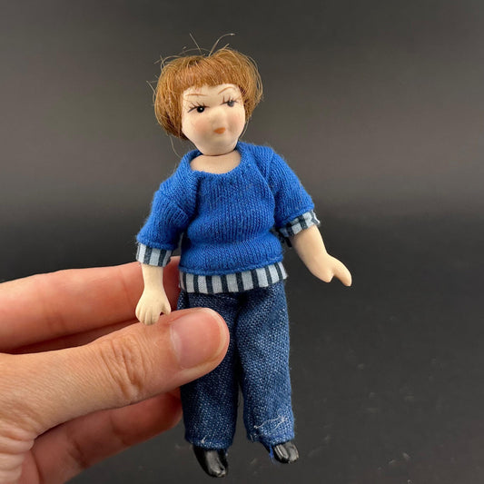 1:12 Scale Porcelain girl Doll – Dollhouse Miniature Child – Movable Head and Limbs – Blue Sweater & Jeans – 4” (10 cm)